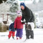 2: Ian Miller shovels snow from a sidewalk in his Port Angeles neighborhood on Monday. (Jesse Major/Peninsula Daily News)