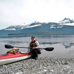 Susan Marie Conrad, pictured with her kayak Camellia, will speak in Sequim on Wednesday about her solo adventure up the Inner Passage.