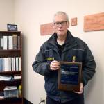 East Jefferson Fire-Rescue Chief Gordon Pomeroy was honored for his work with Jefferson Healthcare on responding to patients that have gone into cardiac arrest. (Cydney McFarland/Peninsula Daily News)