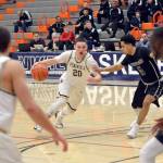 Rick Ross/Peninsula College                                Peninsula&rsquo;s Cole Rabedeaux, left, drives against Portland&rsquo;s Joe Morales during the Pirates&rsquo; 70-62 win in the opening round of the NWAC Men&rsquo;s Basketball Tournament on Thursday at Everett Community College.