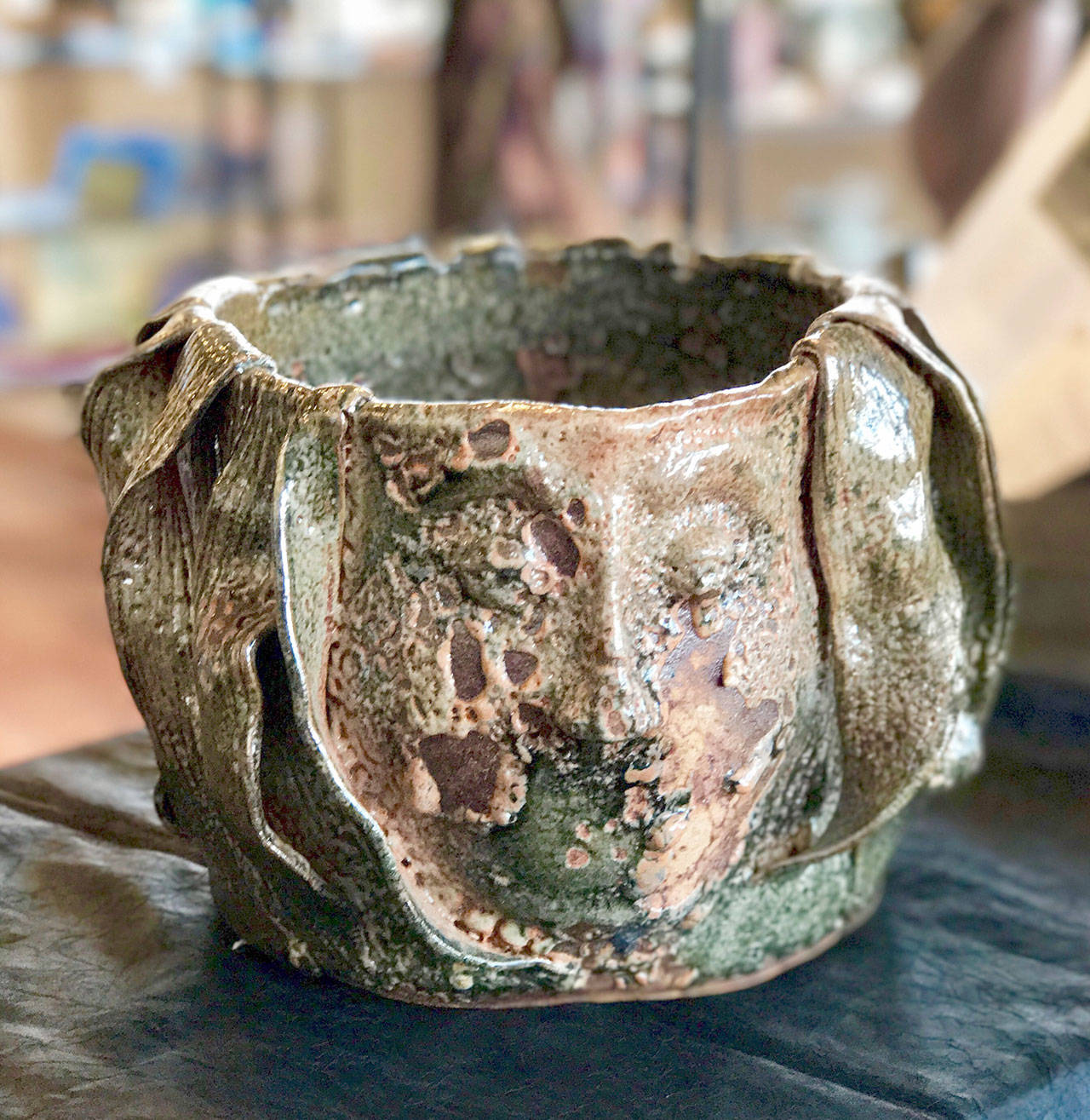 Terri Enck’s ceramics depict images of the sea at Harbor Art.