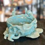 Terri Enck&rsquo;s ceramics depict images of the sea at Harbor Art.