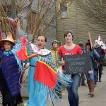 Carmen Bitzer, left, and Sabrina Hill lead a march through Port Townsend on Friday in solidarity with a march in Washington, D.C., to protest the Dakota Access pipeline. (Cydney McFarland/Peninsula Daily News)