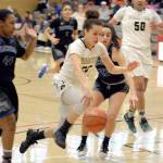Rick Ross/Peninsula College Peninsula guard Sephora Yayouss brings the ball up the court against Tacoma&rsquo;s Shoni Prichett (44) and Sidra Malik (32) in Peninsula&rsquo;s 69-61 win in the opening round of the NWAC tournament on Saturday.