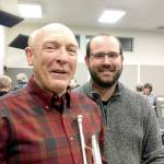 Pictured are soloist Randy Stillwell, left, and Sequim City Band conductor Tyler Benedict.