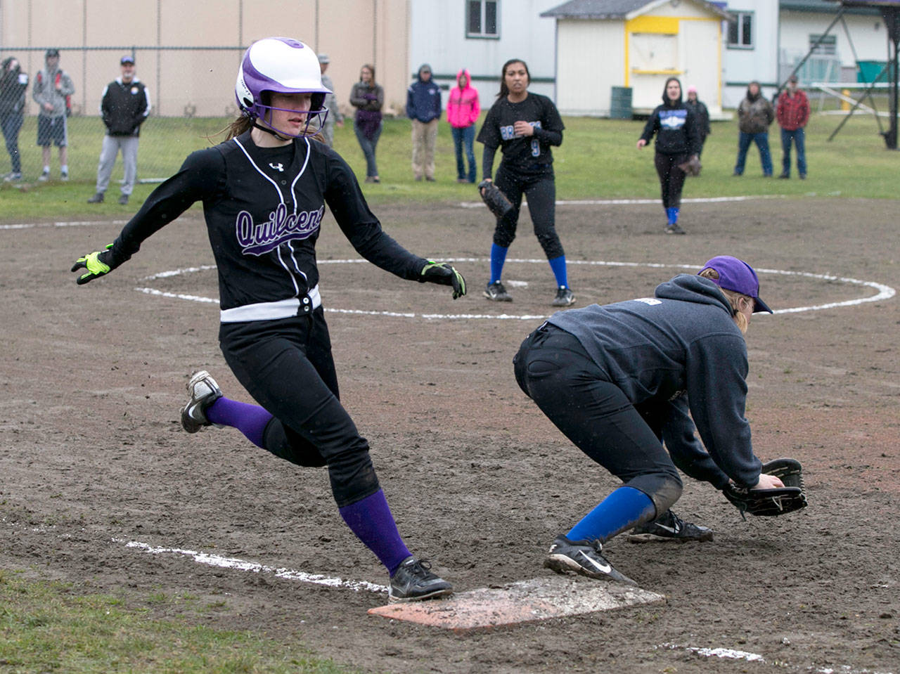 Steve Mullensky/for Peninsula Daily News                                Quilcene&rsquo;s Allison Jones legs out a base hit during the Rangers&rsquo; 11-1 win over La Conner on Friday.