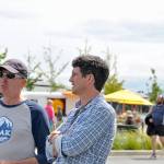 Race boss Daniel Evans, right, talks to an unidentified racer in Port Townsend at the starting line of last year&rsquo;s Race to Alaska. (Northwest Maritime Center)
