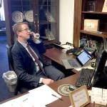 U.S. Rep. Derek Kilmer speaks with a constituent before heading to the floor to vote against the health care bill Friday in Washington, D.C.