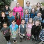 Winners of the annual Martin Luther King Jr. Race Equality Essay contest for the Port Angeles School District gather after receiving their certificates before the Port Angeles City Council. The winners include, front row from left, Kya Baker, kindergarten, Roosevelt School; Miriam Cobb, second grade, Franklin School; Levi Jimenez, first grade, Jefferson School; Evelyn Johnson, first grade, Roosevelt; Logan Wyatt Botero, kindergarten, Franklin; and Jonah Poovey, kindergarten, Jefferson; second row from left, Chloe Pearson, second grade, Hamilton School; Henry Zelenka, second grade, Hamilton; Addisyn Horton, first grade, Jefferson; Isabelle Felton, fifth grade, Dry Creek School; Lauryn Chapman, fifth grade, Roosevelt; Arlo Pullara, third grade, Roosevelt; Milo Smith, third grade, Roosevelt; and Nicholas Morrison, third grade, Jefferson; and back row from left, Brodey Jacobs, fourth grade, Roosevelt; Cole Beeman, fourth grade, Roosevelt; Liz Munro, fourth grade, Jefferson; Jackson Tesreau, fifth grade, Franklin; Lillien Erlwein, sixth grade, Franklin; and Bryant Hoch, sixth grade, Jefferson. Not pictured: Zackary Pierce, sixth grade, Roosevelt. (Keith Thorpe/Peninsula Daily News)