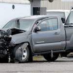 A pickup truck sits in front of Fire Chief Equipment at 936 Marine Drive after smashing through a utility pole Friday in Port Angeles. (Keith Thorpe/Peninsula Daily News)