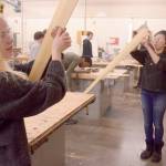 Students from Port Townsend High School sand paddles in the maritime woodworking class, one of many projects that have been implemented as a part of the Maritime Discovery Initiative. (Cydney McFarland/Peninsula Daily News)