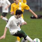 Keith Thorpe/Peninsula Daily News                                Port Angeles&rsquo; Andrew Methner slips in front of Sequim&rsquo;s Matthew Craig during the Roughriders&rsquo; 3-0 win over the Wolves at Civic Field.