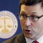 Washington State Attorney General Bob Ferguson speaks about President Trump&rsquo;s new executive order at a news conference Monday in Seattle. (Elaine Thompson/The Associated Press)