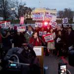 People gather for a protest against President Donald Trump&rsquo;s new travel ban order in Lafayette Park outside the White House on Monday in Washington, D.C. (Andrew Harnik/The Associated Press)