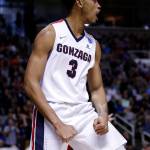 Gonzaga forward Johnathan Williams (3) celebrates after scoring against Xavier during the first half of an NCAA Tournament college basketball regional final game Saturday, March 25, 2017, in San Jose, Calif. (AP Photo/Tony Avelar)