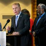 In this Nov. 9, 2016, photo, Seattle Mayor Ed Murray, second from left, speaks at a post-election event of elected officials and community leaders at City Hall in Seattle. (Elaine Thompson/The Associated Press)