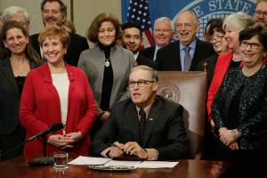 Inslee signs bill ensuring schools’ 28 percent levy-lid secure until 2019 expiration