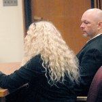 Adam Chamberlin, right, sits with attorney Karen Unger in Clallam County Superior Court in Port Angeles in October. (Keith Thorpe/Peninsula Daily News)