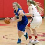 #5 Steve Mullensky/for Peninsula Daily News Chimacum&rsquo;s Mechelle Nisbet, left, looks to pass while defended by Port Townsend&rsquo;s Kaitlyn Meek. Nisbet has been voted the All-Peninsula Girls Basketball MVP by coaches and the sports staff of the Peninsula Daily News.