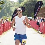 Port Angeles resident Colby Wait, pictured finishing the 2015 North Olympic Discovery Marathon, will run the Boston Marathon on Monday along with his girlfriend Lucy Flynn.