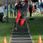 Keith Thorpe/Peninsula Daily News Sean Bitegeko of Neah Bay competes in the long jump during Thursday&rsquo;s meet at Crescent High School in Joyce.