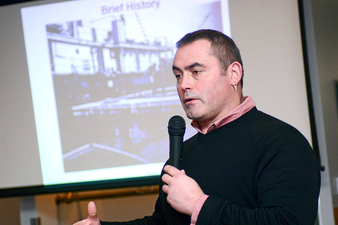 Innes Weir, general manager of Seattle-based Cooke Aquaculture Pacific LLC, told Port Angeles Business Association members Tuesday the business plans to relocate its Atlantic-salmon farming operation due to the U.S. Navy&rsquo;s pier project on Ediz Hook. (Jesse Major/Peninsula Daily News)