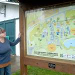 Clallam County Fair manager Shari Ioffrida looks over a map of the fairgrounds in Port Angeles on Wednesday. (Keith Thorpe/Peninsula Daily News)