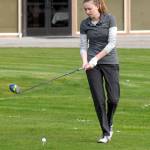 Keith Thorpe/Peninsula Daily News Sequim&rsquo;s Alex McMenamin prepares to tee off on the first hole in a three-way meet with Port Angeles and North Kitsap on Wednesday at the Cedars at Dungeness near Sequim.