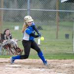 Steve Mullensky/for Peninsula Daily News Chimacum&rsquo;s Bradyn Nelson drives in two runs with this triple in a game against rival Port Townsend.