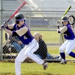 Keith Thorpe/Peninsula Daily News Sequim&rsquo;s Ian Miller bats in the fifth inning against Bremerton as teammate Ryan Clark practices his swing in the on-deck circle on Wednesday in Sequim.