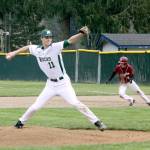 Dave Logan/for Peninsula Daily News Port Angeles pitcher Colton McGuffey throws to the plate while Kingston baserunner Ethan Sax breaks for second base in an attempt at a hit and run.