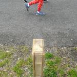Joggers pass over a sensor imbedded in the pavement that tallies foot and bicycle traffic on the Waterfront Trail east of Port Angeles City Pier. (Keith Thorpe/Peninsula Daily News)