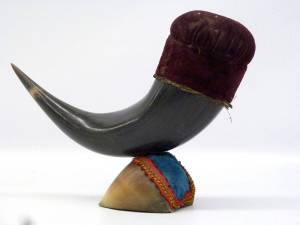 A buffalo horn and hoof pincushion from the Jefferson County Historical Society collection.