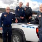 From left, Bob Agee, Gary Marler, Jim Walsh and Charles Devoney, Port Angeles Police Department volunteers who have together donated an estimated 20,000 hours of service to the department. (Keith Thorpe/Peninsula Daily News)