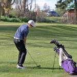 Steve Mullensky/for Peninsula Daily News Sequim&rsquo;s Paul Jacobsen, chips for the green on the first hole during a match against Port Townsend at Port Townsend Golf Club.