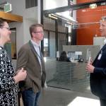 U.S. Rep. Derek Kilmer, center, tours the Port Angeles clinic of the North Olympic Healthcare Network on Friday with Kate Weller, the center&rsquo;s chief medical officer, and CEO Michael Maxwell. (Keith Thorpe/Peninsula Daily News)
