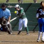 Keith Thorpe/Peninsula Daily News Port Angeles&rsquo; Nikaila Price connects on one of three Roughriders&rsquo; home runs in a 10-0 win over Olympic.