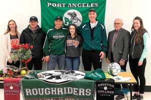 COLLEGE SPORTS: Port Angeles’ Clark signs to play softball and soccer