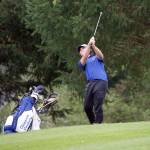 Steve Mullensky/for Peninsula Daily News Chimacum&rsquo;s Logan Storm watches the flight of his drive on a par three at Port Ludlow Golf Club on Tuesday. Storm shot the low round of the day, a 42.