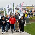 A line of more than 400 marchers make their way through West End Park on the Port Angeles waterfront Saturday to raise awareness of climate change and to promote good stewardship of the environment. (Keith Thorpe/Peninsula Daily News)