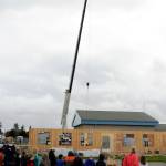 Students at Greywolf Elementary School look on as construction begins in full on two modular buildings at their Carlsborg school Monday. (Michael Dashiell/Olympic Peninsula News Group)