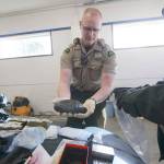 Suspicious vehicle report yields heroin, meth, guns