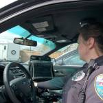 Sequim Police Officer Stephanie Benes readies her 2016 Ford Interceptor for duty on April 11, at the Sequim Civic Center. City staff plans to buy three newer models this year bringing the Sequim Police Department&rsquo;s total to 10 Interceptors. Sequim Gazette photo by Matthew Nash