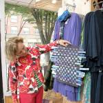 Helen Gunn of Port Townsend holds art from a local child submitted for last year&rsquo;s Art Wave. (Port Townsend Main Street Program)