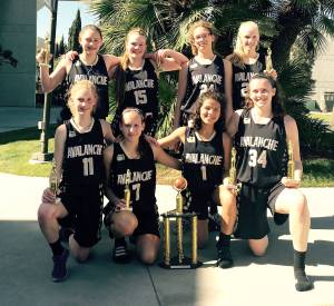 The Olympic Avalanche Black celebrate winning the eighth-grade girls&rsquo; division at the Swoosh Basketball Spring Slam Tournament in Anaheim, Calif. After winning the tournament, the girls celebrated by going to Disneyland. From left, back row, are Jada Cargo-Acosta, Myra Walker, Madison Cooke and Maggie Ruddell. From left, front row, are Emilia Long, Hannah Reetz, Camille Stensgard and Jaida Wood.