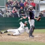 Luke Angevine slides safely into home as the second run of the game for PA as the NK catcher Carson Bower stands waiting for the ball as if to say - give me the ball.