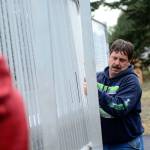 Warren Stevens, facilities and maintenance director for the Lower Elwha Klallam Tribe, helps build bleachers at the tribe&rsquo;s new athletic facility, the Billy Whiteshoes Memorial Park. (Jesse Major/Peninsula Daily News)