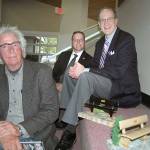 Bob Stokes, Corey Delikat and Dave Walter, from left, collaborated on a pilot project to build prototype park benches out of recycled composite plastic that was outlined last week at a Port Angeles City Council meeting. (Paul Gottlieb/Peninsula Daily News)