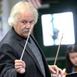 Longtime Port Angeles orchestra teacher Ron Jones conducts the Port Angeles High School chamber orchestra Monday. Jones will retire at the end of this school year. (Jesse Major/Peninsula Daily News)