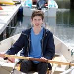 Milo Rolland, 2017 Heart of Service Award winner, in his 14-foot sailing dory at Point Hudson Marina. (Steve Mullensky/for Peninsula Daily News)